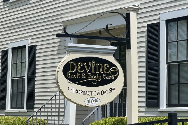 Devine Back & Body Care signage